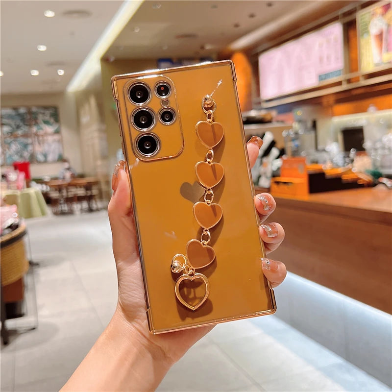 Chic Plating Silicone Love Heart Bracelet Case for Samsung Galaxy S24, S23, S22, S21 Ultra Plus & A Series – Soft and Stylish 5G Covers!