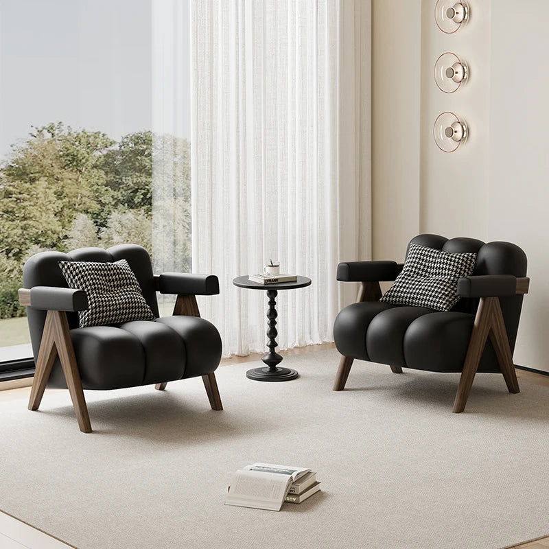 Scandinavian Luxury Lounge Chair – Black Leather Armchair with Wooden Legs for Modern Décor